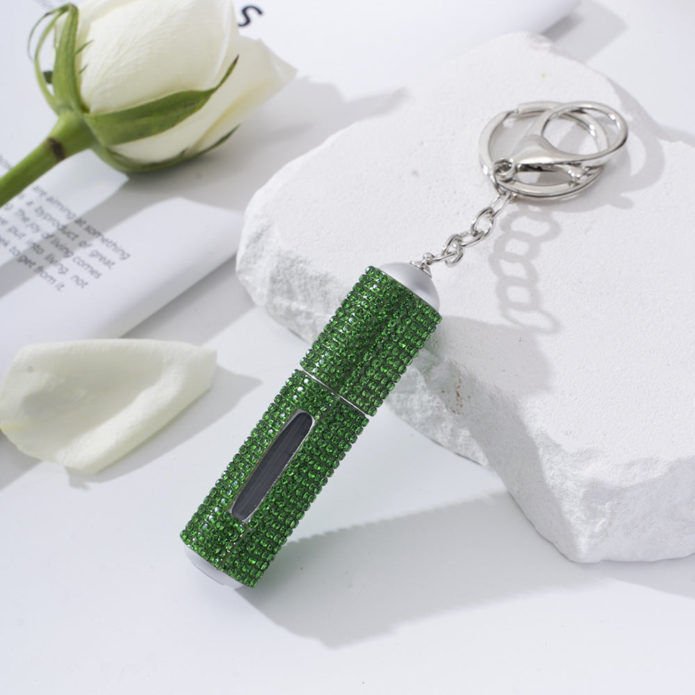 Wholesale  diamond-studded creative perfume bottle keychain is easy to carry